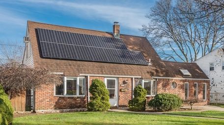The Levittown house comes with solar panes and