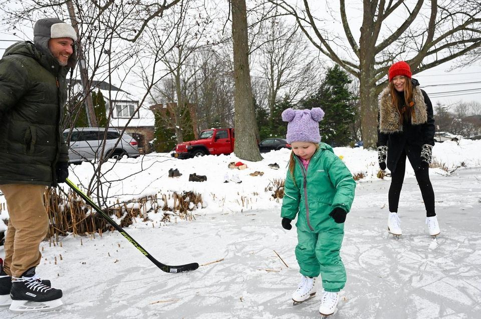 Elodie Meehan, 4, of Brightwaters, skates on ice