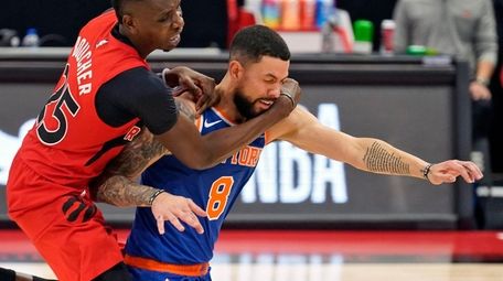 Raptors forward Chris Boucher and Knicks guard Austin