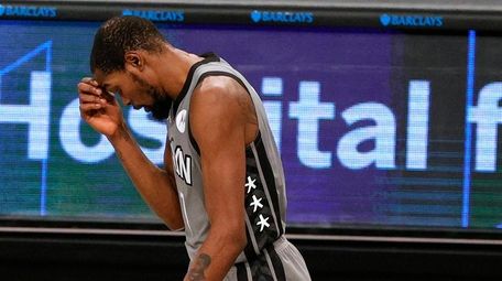 Kevin Durant #7 of the Nets reacts during