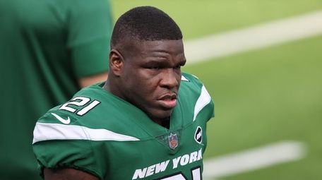 Frank Gore #21 of the Jets looks on