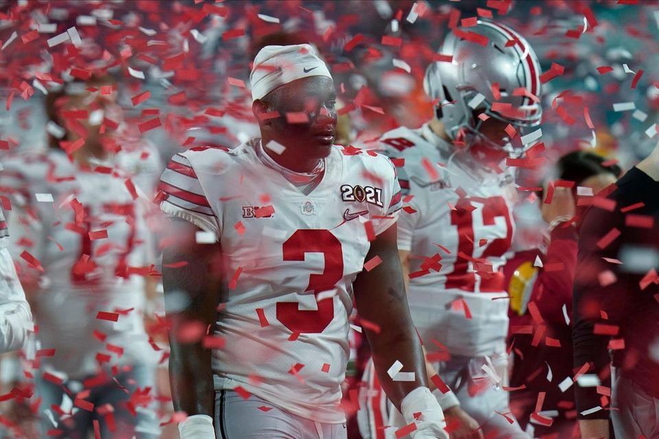 Ohio State players leave the field after their