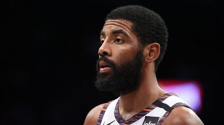 Kyrie Irving (11) of the Brooklyn Nets looks