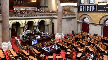 Members of the New York state Assembly work