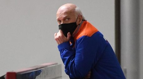 Islanders general manager Lou Lamoriello observes practice during