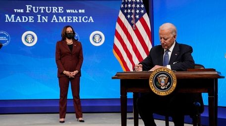 President Joe Biden signs an order closing loopholes