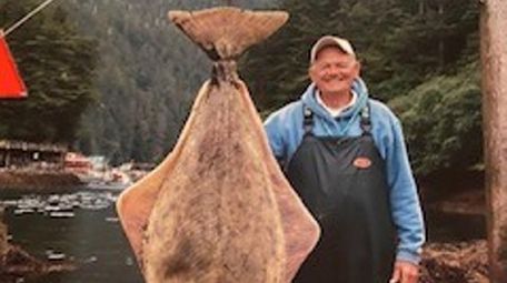 Neil VanGinhoven with a Halibut caught in Alaska.