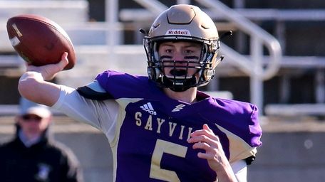 Sayville QB Jack Cheshire looks to throw against
