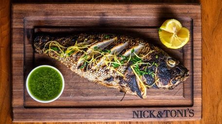 Roasted whole fish with salsa verde at Nick