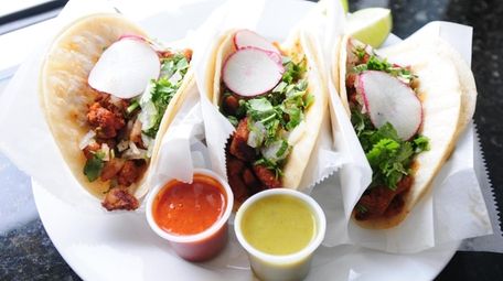 A trio of carnitas tacos at El Paso