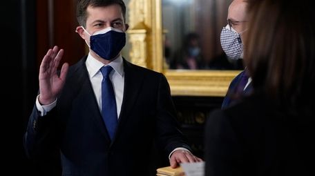 Transportation Secretary Pete Buttigieg is sworn in Wednesday