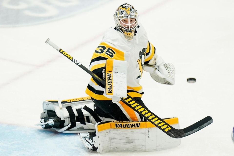 Pittsburgh Penguins goaltender Tristan Jarry (35) deflects a