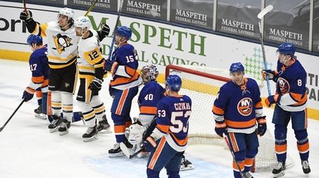 Penguins center Zach Aston-Reese celebrates his goal with
