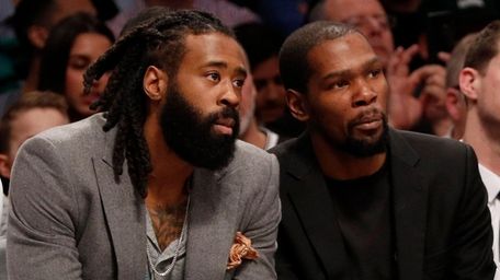 DeAndre Jordan, left, and Kevin Durant of the
