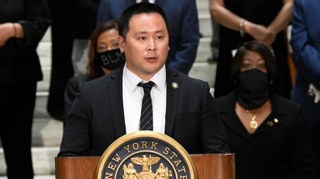Assemblyman Ron Kim, D-Queens, speaks during a press