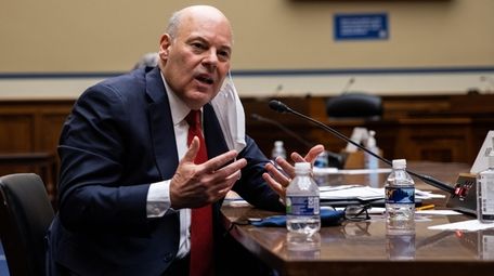 Postmaster General Louis DeJoy at a House hearing