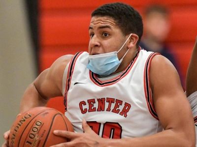 Jaden Kealey of Center Moriches grabs the rebound