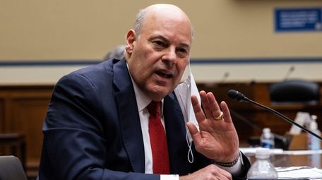 United States Postmaster General Louis Dejoy speaks during