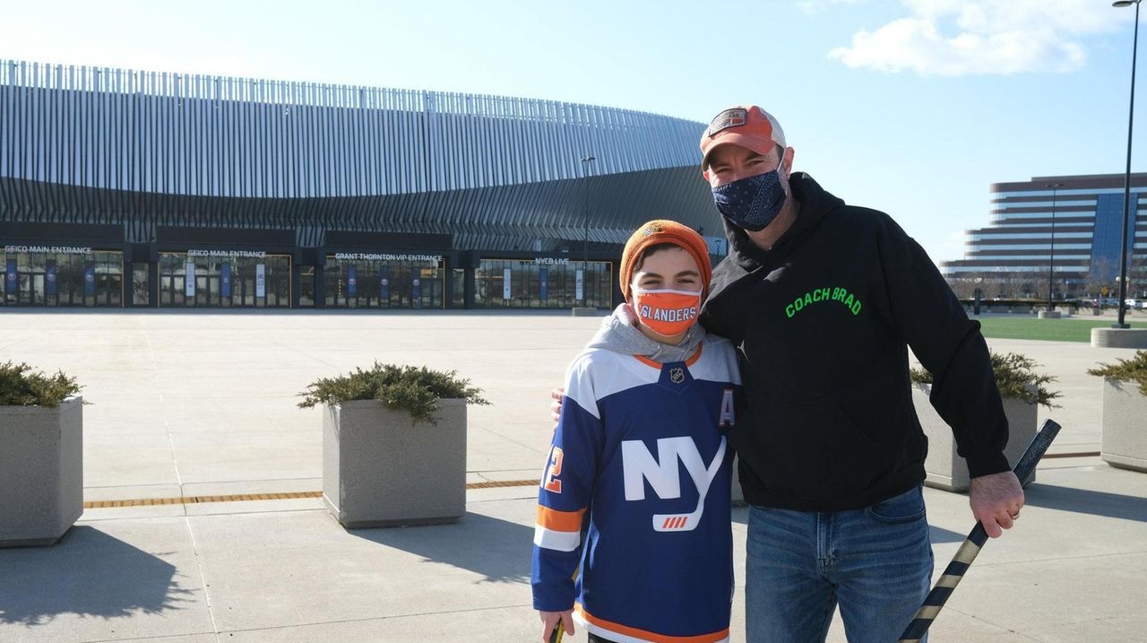 Brad Shafran and his son, Max, are Islanders