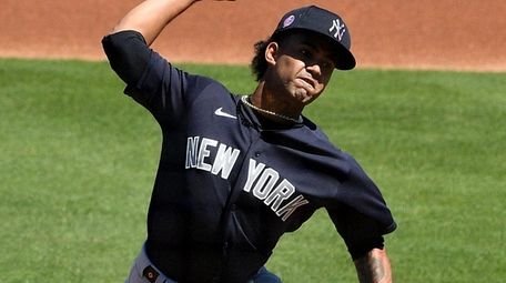 Deivi García of the Yankees delivers a pitch