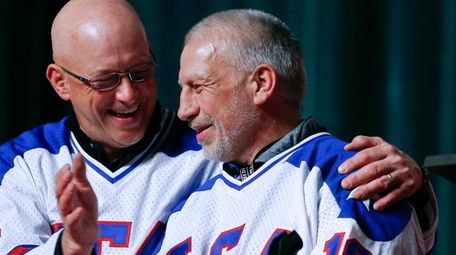 Jack O'Callahan, left, and Mark Pavelich of the