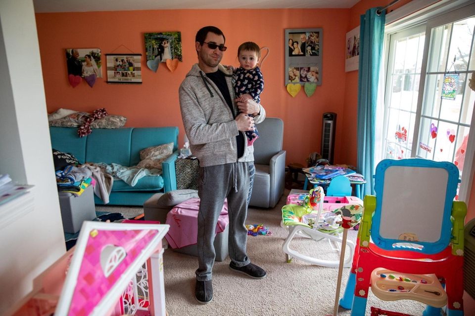 Robert Cerruti with daughter Carmella, 8 months, in