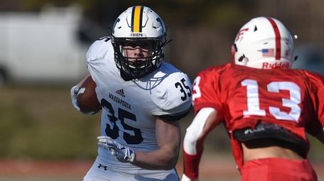 Timothy Morrow of Massapequa picks up yards as