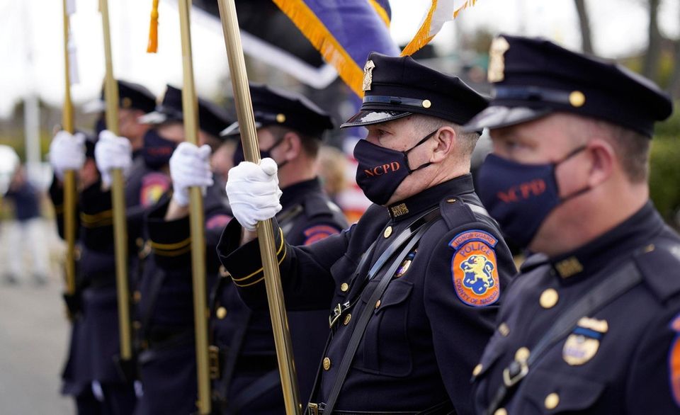 Members of Nassau County Police Department, and town