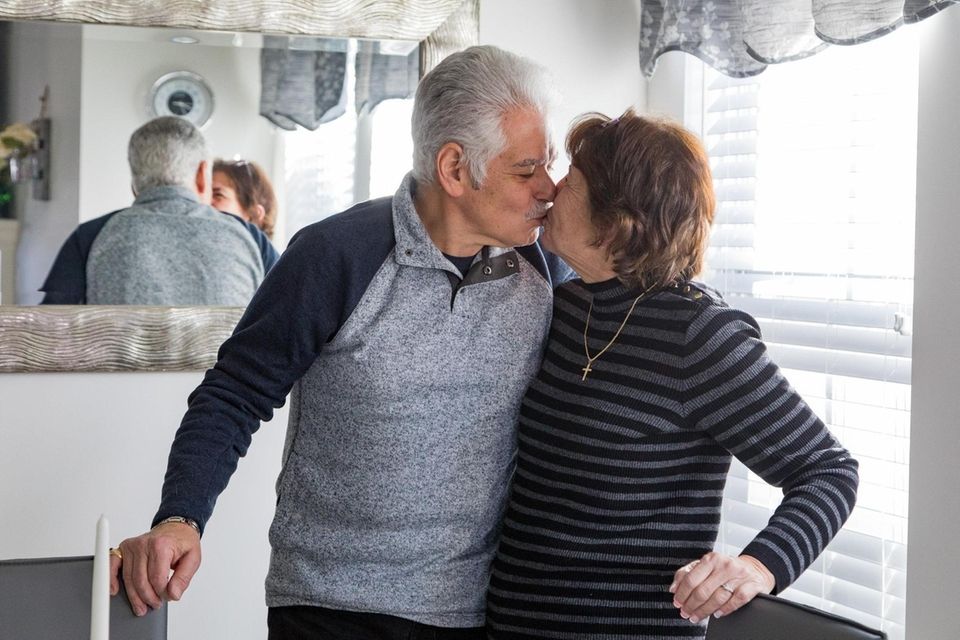 Pat Castillo and Al Perreca kiss in East