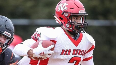 Center Moriches' Judah Williams gets caught from behind