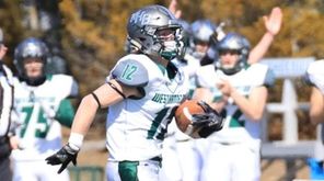 Westhampton #12 carries the ball Suffolk High School