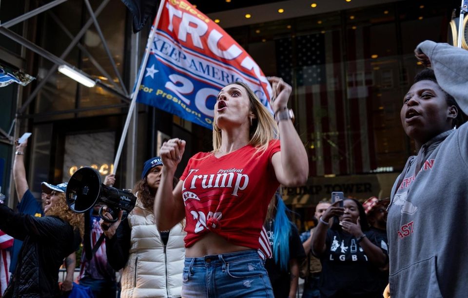 Supporters of President Donald J. Trump gather in
