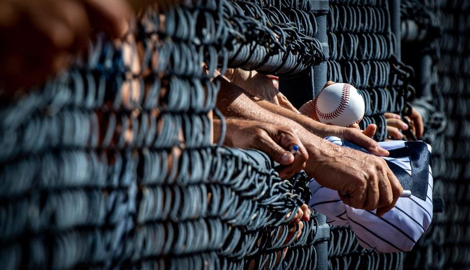 New York Yankee fans waiting for autographs from