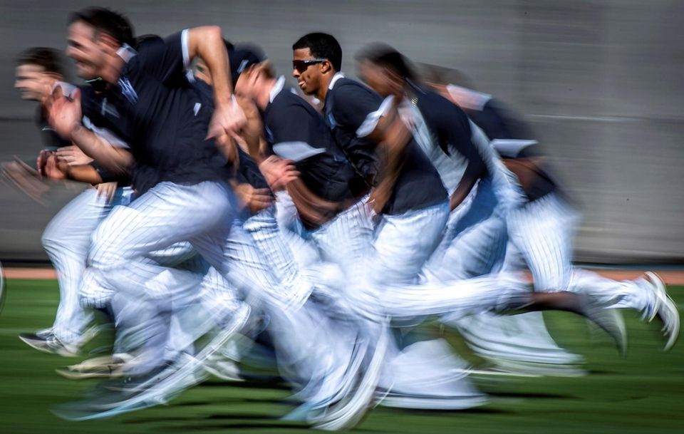 New York Yankees' pitchers run interval drills during