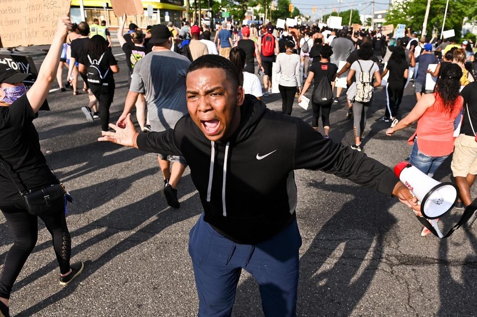 Jahshua Taylor, of Westbury (cq), shouts as protestors