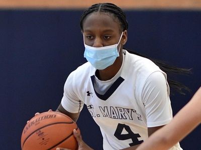 Taylor Barbot #4 of St. Mary's gets pressured