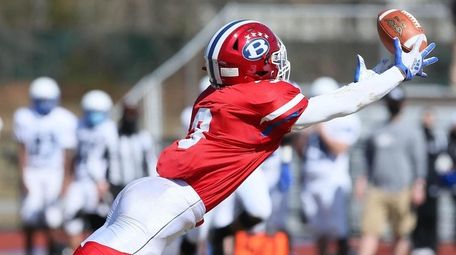 Bellport's Ka'Shaun Parrish (3) dives for a ball