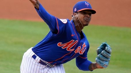Mets starting pitcher Marcus Stroman throws during the
