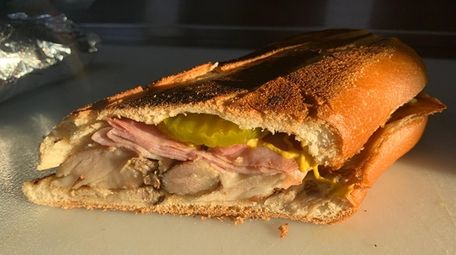 A Cuban sandwich from Greekish Rican Grill food