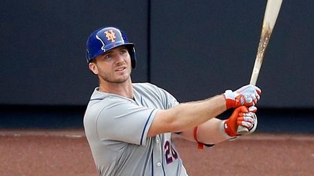 Pete Alonso #20 of the Mets follows through