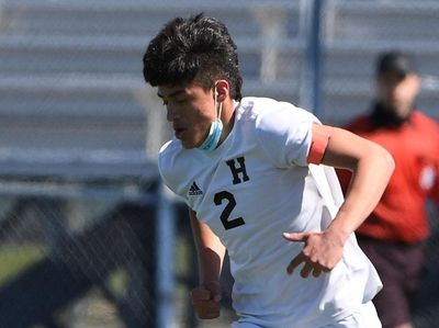 Hicksville's Anthony Bonilla controls the ball against Oceanside