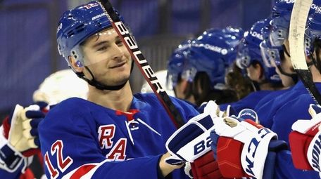 The Rangers' Julien Gauthier celebrates his first career