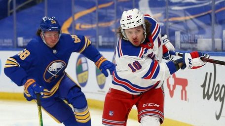 Sabres forward Victor Olofsson chases Rangers forward Julien