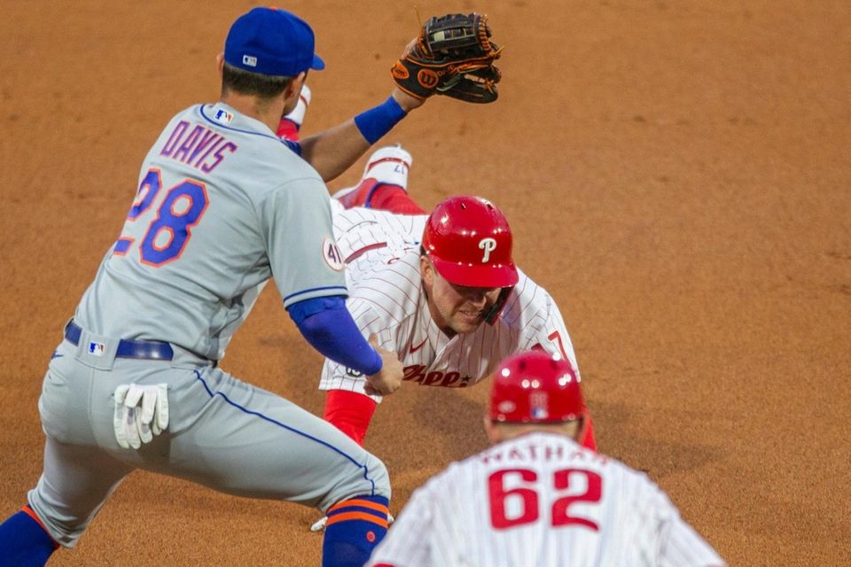Philadelphia Phillies first baseman Rhys Hoskins is out