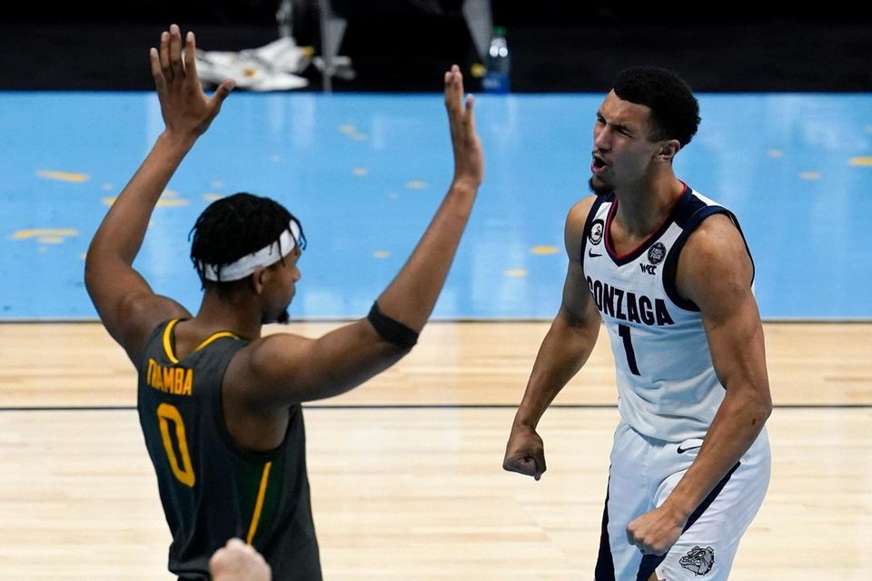 Gonzaga guard Jalen Suggs (1) celebrates in front