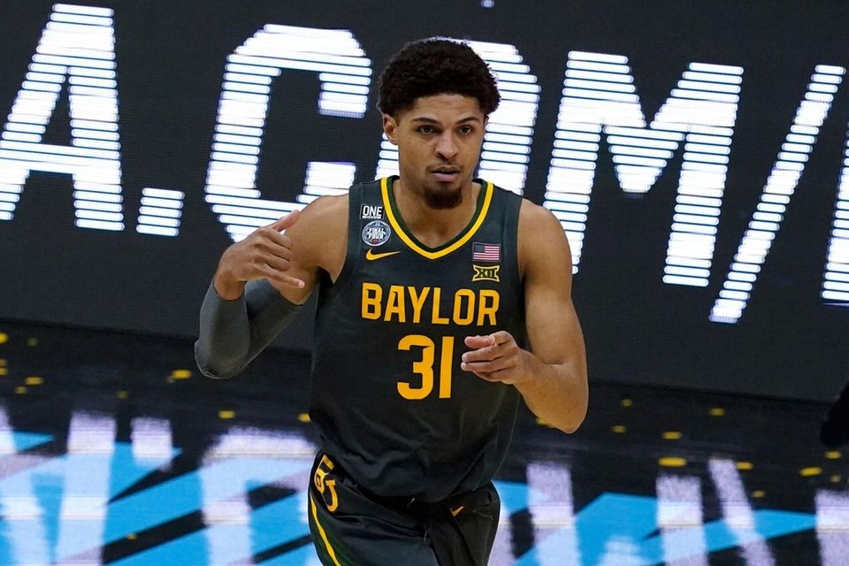 Baylor guard MaCio Teague (31) celebrates after making