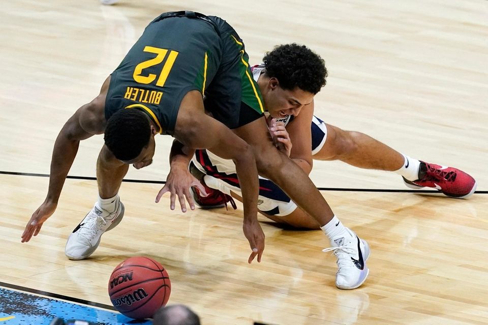 Baylor guard Jared Butler (12) fights for a
