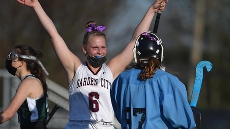 Olivia Kaval of Garden City, left, and goalie