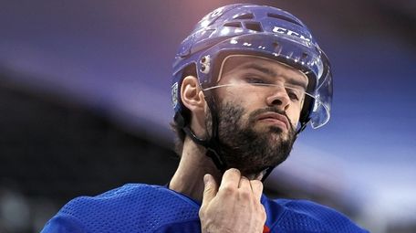 The Rangers' Colin Blackwell skates as players warm