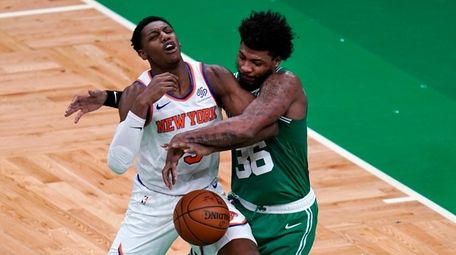Boston Celtics guard Marcus Smart (36) fouls Knicks